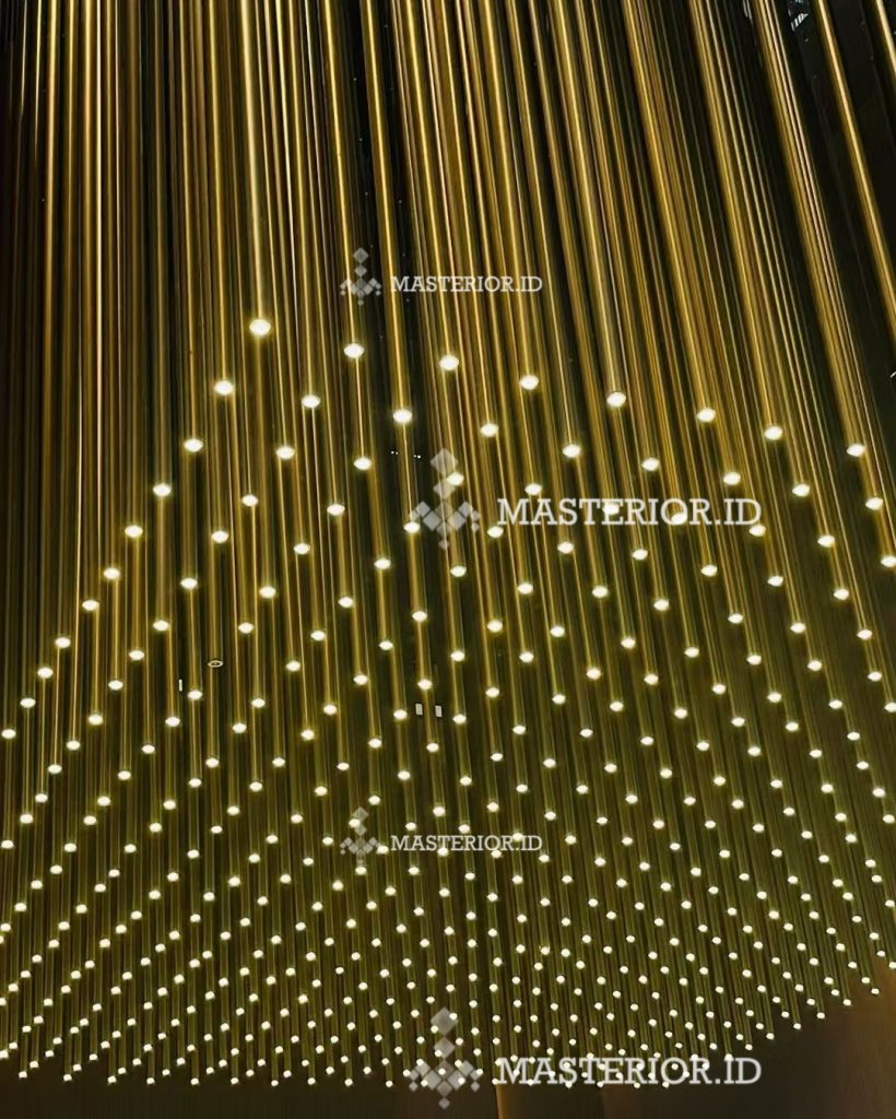 Large ceiling installation featuring hundreds of suspended LED pendant lights in a geometric arrangement.